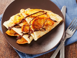 Палачинки Креп Сюзет (Crepe Suzette) с портокалов маслен сос - снимка на рецептата Палачинки Креп Сюзет (Crepe Suzette) с портокалов маслен сос - снимка на рецептата